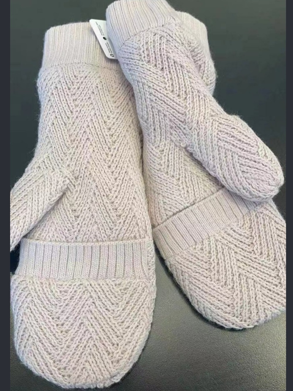 Lululemon: pale pink mittens